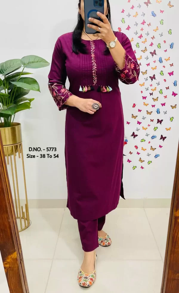 Girl wearing a purple Elegant Cotton Slub Kurti Pant Cord Set – Hand Aari Embroidery & Pintex Work from dailyimprovise