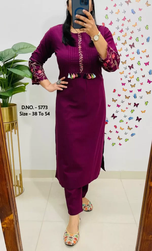 Girl wearing a purple Elegant Cotton Slub Kurti Pant Cord Set – Hand Aari Embroidery & Pintex Work from dailyimprovise, and clicking selfie