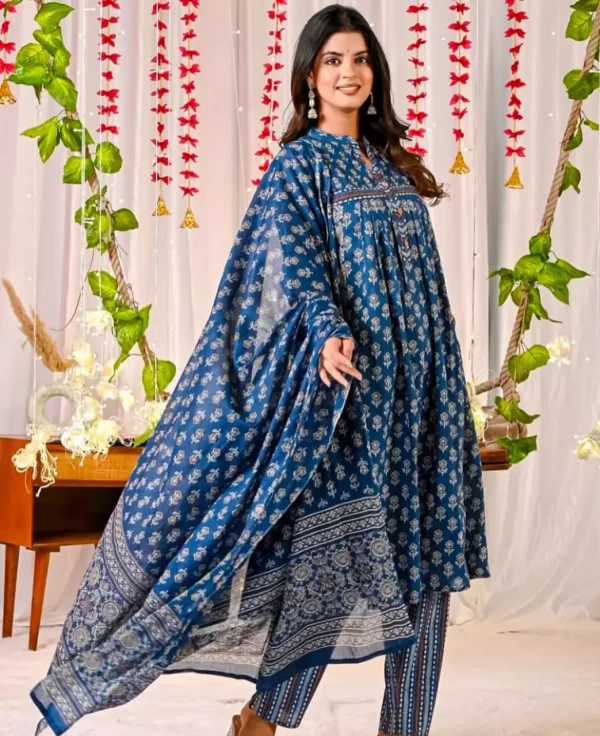 Girl wearing a Elegant Jaipur Print 3-Piece Cotton Suit – Handcrafted Kurti with Malmal Dupatta from dailyimprovise, and having a smile on her face