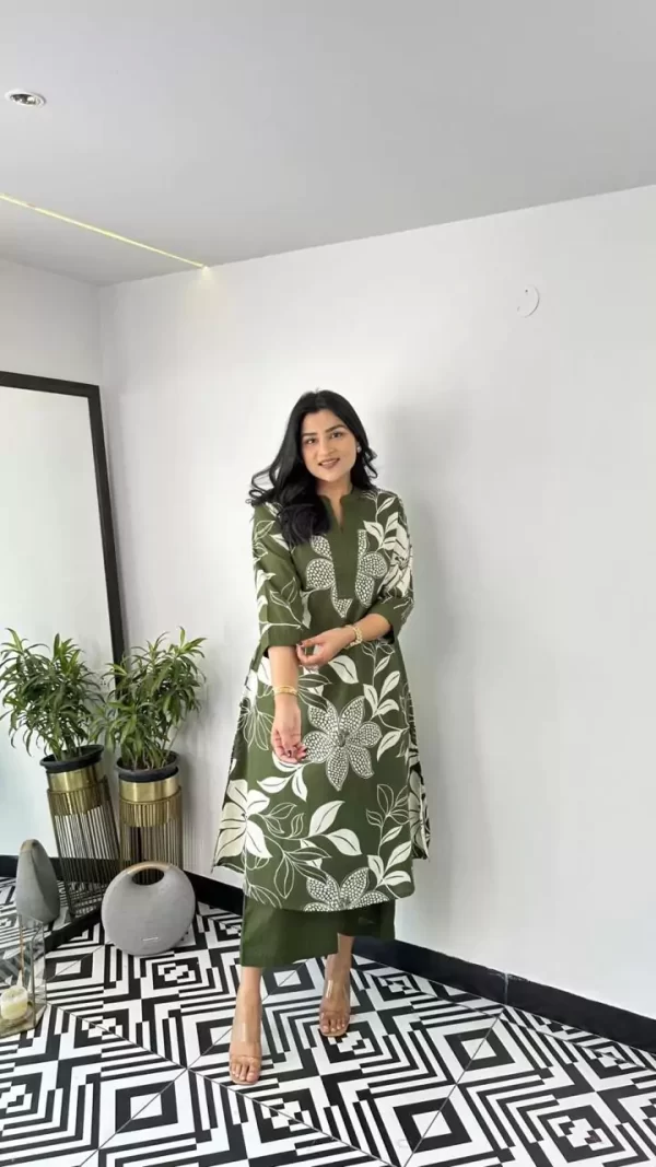 Girl wearing a green Summer Breeze Rayon Kurti Pant Set – Cool & Stylish Ethnic Wear from dailyimprovise, and posing for photo