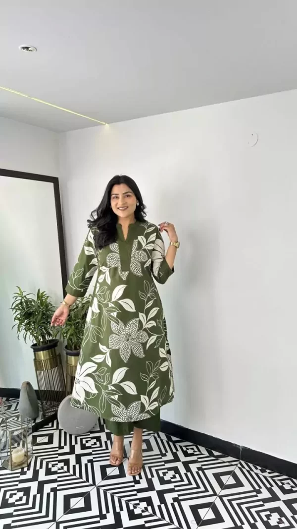 Girl wearing a green Summer Breeze Rayon Kurti Pant Set – Cool & Stylish Ethnic Wear from dailyimprovise, and having a smile on her face