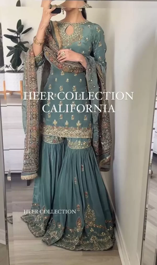 Girl wearing a Luxury Chinon Silk Kurti Sharara Set – Sequin & Thread Embroidery with Dupatta from dailyimprovise, and taking pictures