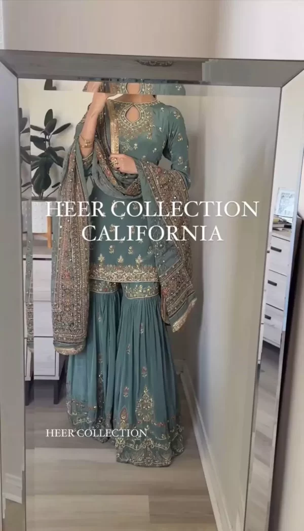 Girl wearing a Luxury Chinon Silk Kurti Sharara Set – Sequin & Thread Embroidery with Dupatta from dailyimprovise, and taking selfies