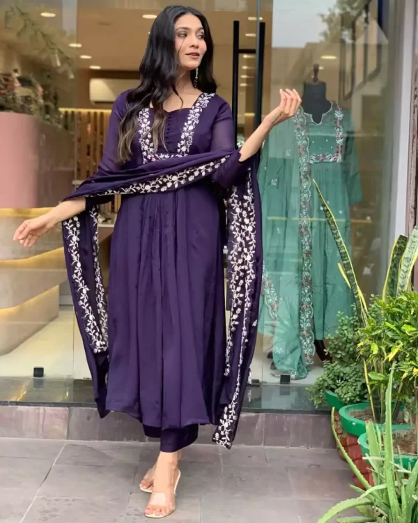 Girl wearing a Designer Anarkali Suit Set – Elegant Dora Silk Embroidered 3-Piece Outfit from dailyimprovise, and having a smile on her face