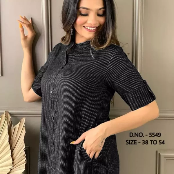 Girl wearing a black pure cotton katha long Kurti top from dailyimprovise, and posing for photo