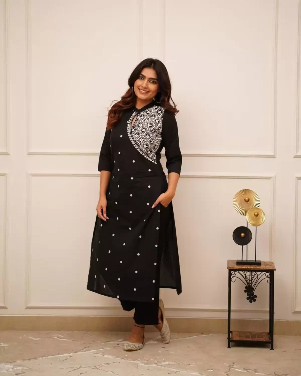 Model wearing black embroidered kurti and pant set for office