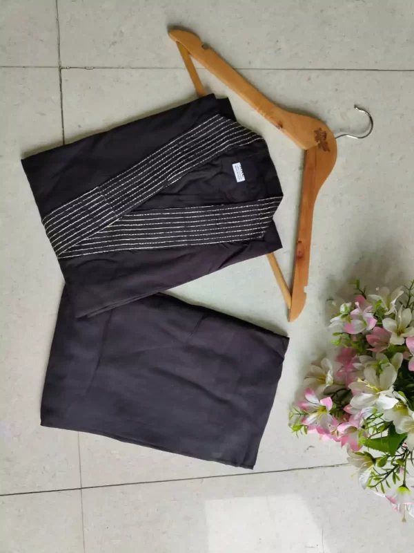 black folded Stylish Heavy Rayon Cord-Set Suit with V-Neck & Matching Pants from dailyimprovise