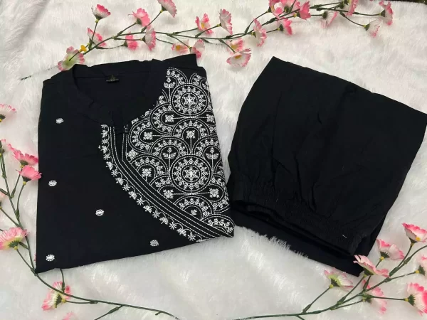 Black rayon kurti and pant set displayed neatly
