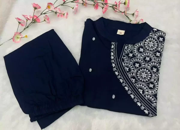 Display of dark blue embroidered rayon kurti pant set