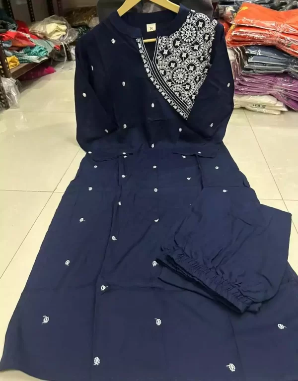 Display of dark blue embroidered rayon kurti pant set