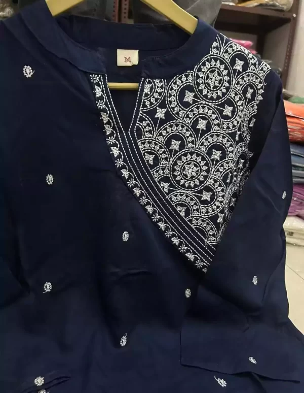 Folded view of dark blue rayon kurti and pant for women