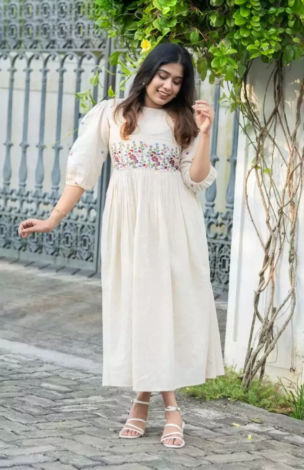 Girl wearing a white rayon dress floral embroidery crochet lace candid from dailyimprovise
