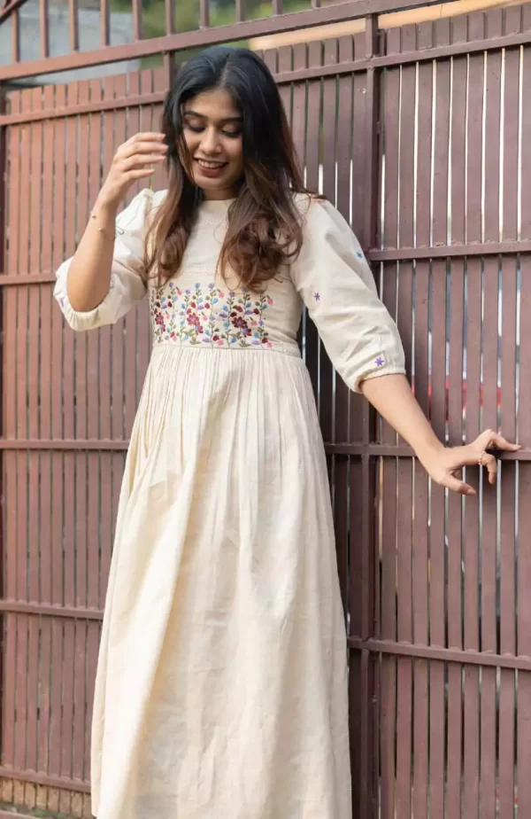 girl wearing off white rayon dress floral embroidery crochet lace gate from dailyimprovise