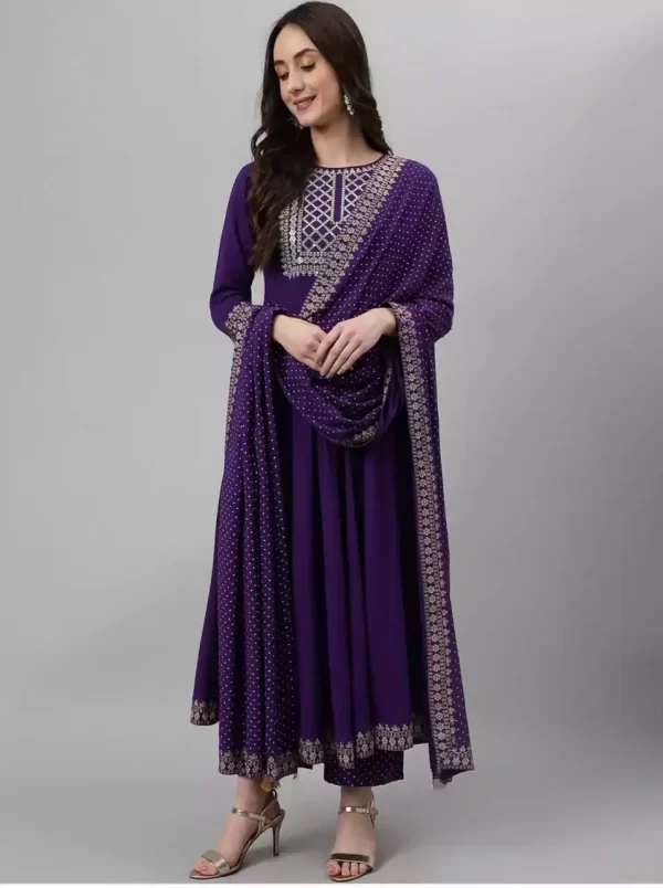 A girl wearing a violet Embroidered Anarkali Kurti Set with Bandhani Pant & Dupatta from DailyImprovise and having a smile on her face