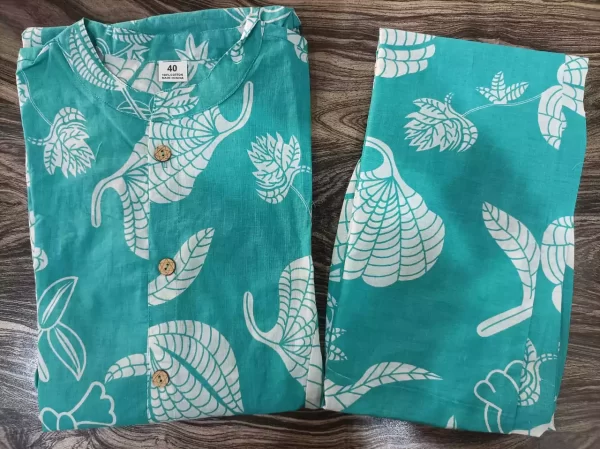 Flatlay display of green Jaipuri kurti with ankle-length pant