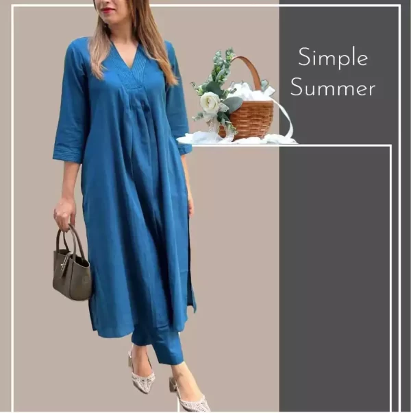 Girl wearing a blue Stylish Heavy Rayon Cord-Set Suit with V-Neck & Matching Pants from dailyimprovise for simple summer