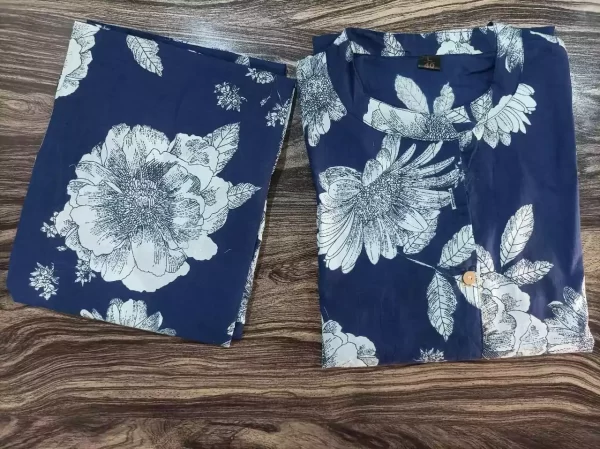 Flatlay of floral Jaipuri cotton kurti and ankle-length pant
