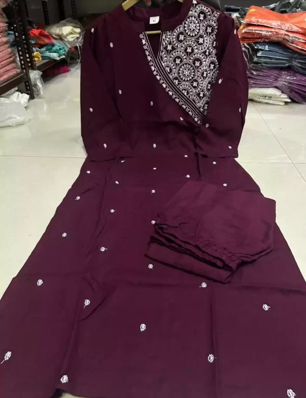 Display of dark blue embroidered rayon kurti pant set