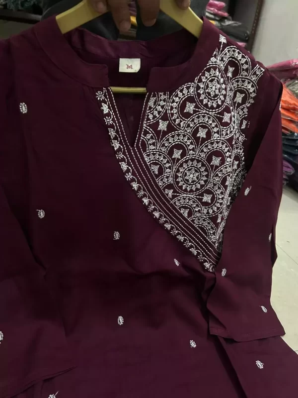 Folded view of dark blue rayon kurti and pant for women