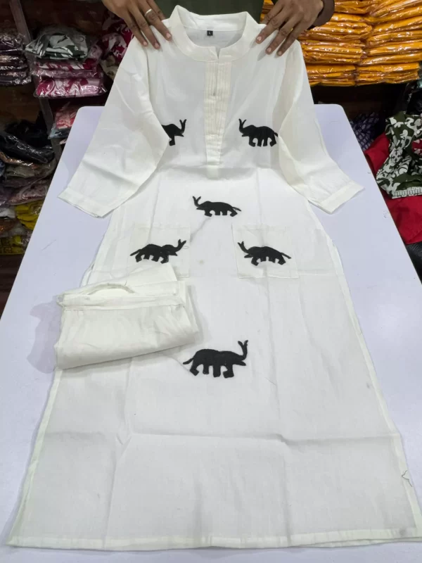 White color Regal Elephant Dhaga Embroidery Cord Set – Pure Cotton V-Neck Suit with Pockets from dailyimprovise
