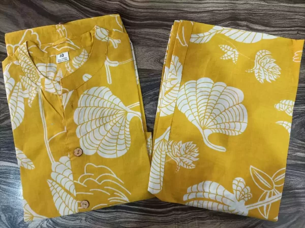 Close-up of yellow floral co-ord kurti and pant outfit
