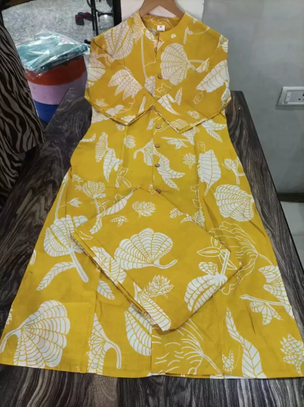 Flatlay of yellow Jaipuri cotton kurti and ankle pant set